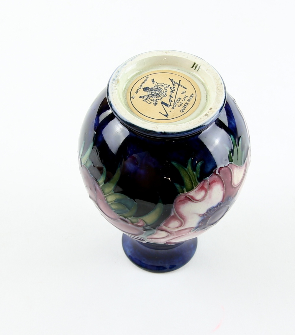 Moorcroft pottery baluster vase, the blue ground with floral decoration, on round foot, paper - Image 3 of 4