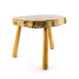 Jim Harries of Pembrokeshire a low stool, maker's plaque on underside of seat, 34 (h) x 44 cm (w)..