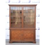Updated description, Large oak bookcase with two glazed cabinet above two inlaid cabinet doors,