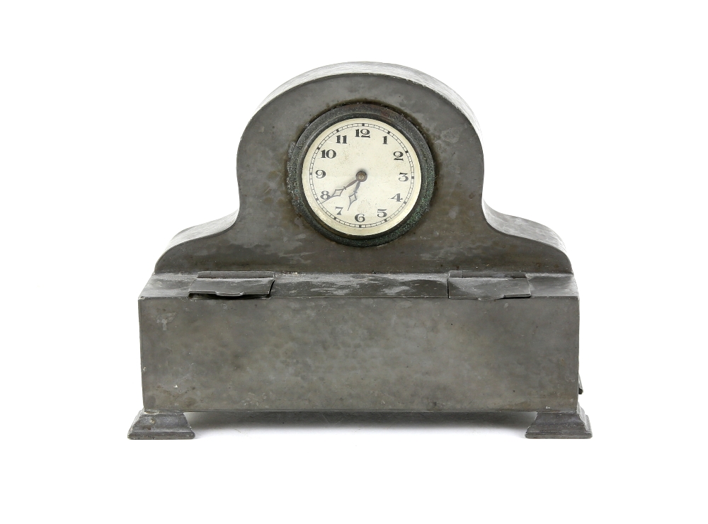 Talbot hammered pewter desk clock fitted with two hinged inkwells 19 x 8 x 16 cm.