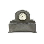 Talbot hammered pewter desk clock fitted with two hinged inkwells 19 x 8 x 16 cm.