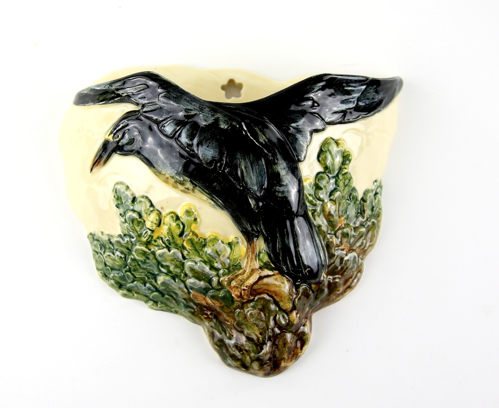 Royal Doulton, an unusual wall pocket with a raven among oak leaves in relief, stamped marks, 19 x