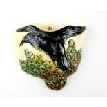 Royal Doulton, an unusual wall pocket with a raven among oak leaves in relief, stamped marks, 19 x