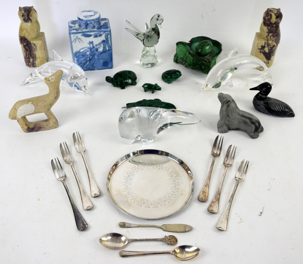 Baccarat polar bear, two Steuben glass dolphins and other decorative items.