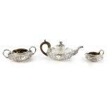 William IV silver three piece tea service, comprising teapot, cream jug and sugar bowl, with