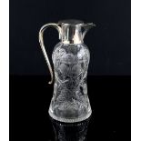 George V silver mounted and cut glass claret jug with floral and foliate decoration, by John