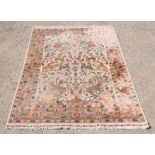 Indian Multani part silk cream ground rug decorated with animals and foliate forms with signature,