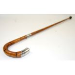 Silver mounted malacca cane, 94 cm long.