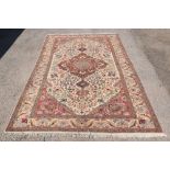Turkish Kayseri cream ground carpet with a main pale ground border, the centre with a medallion
