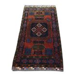 Persian type brown ground rug with multiple borders, the centre with shaped medallions 220cm