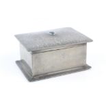 Liberty & Co., Tudric pewter cigarette box with turquoise cabochon and hammered decoration, marked