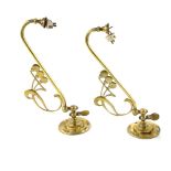 Pair of Art Nouveau brass wall lights, with design of honesty flowers, (converted from gas