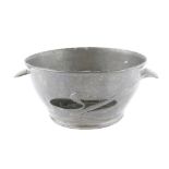 Archibald Knox for Liberty & Co, a Tudric Pewter Bowl, circa 1910, with twin-fin handles, pierced