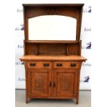 AMENDED DIMENSIONS - Arts and Crafts oak dresser, with two drawers over cabinets with carved