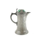 Arts & Crafts pewter jug inset with four green blue Ruskin type roundels to the lid, 19.5cm .