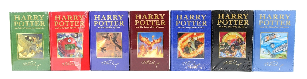 J.K. Rowling, A Full Set of the Deluxe Edition Harry Potter Novels, 7 vol., first deluxe editions,