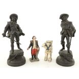 Cast iron Sailor money box, another of an officer, two spelter figures of cavaliers, (4).