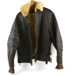 20th century sheepskin flying jacket with four panel back broad Arrow mark to zip pull.