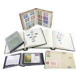 Great Britain Collection in two boxes with two Lighthouse stamp albums, two stock books, four