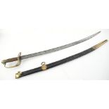 19th century sword with lion pommel and with wire handle, curved blade, 70 cms., in leather and