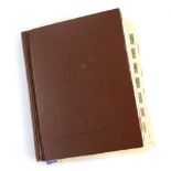 Brown Stamp Album with World Stamps, well filled with Great Britain 1840 1D Black (no margins) used,