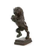 Bronze heraldic lion, 22cm high on a cast iron base and a carved wood heraldic rearing horse 74cm