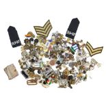 Collection of various military cap badges, and buttons including re-strikes and reproductions.