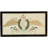 Royal Flying Corps emblem worked in coloured silks on a silk background, framed and glazed 22cm x