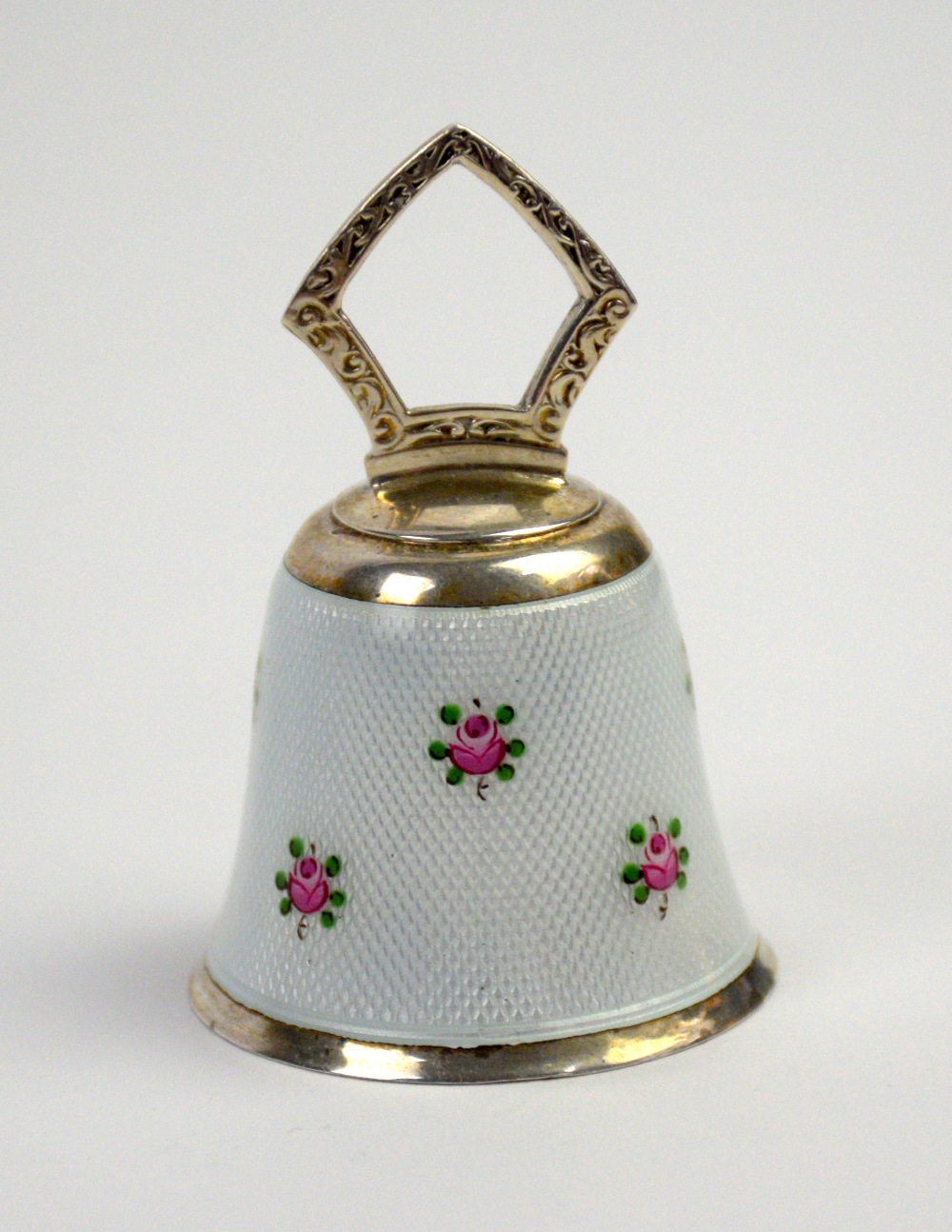 Sterling silver and guilloche enamelled bell with rose decoration,