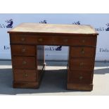 Early 20th century mahogany knee hole desk of seven drawers