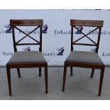 Set of eight mahogany X back dining chairs