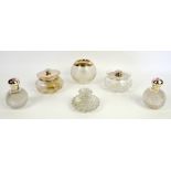 Silver mounted glass match holder two silver mounted perfume bottles, two silver powder jars, and