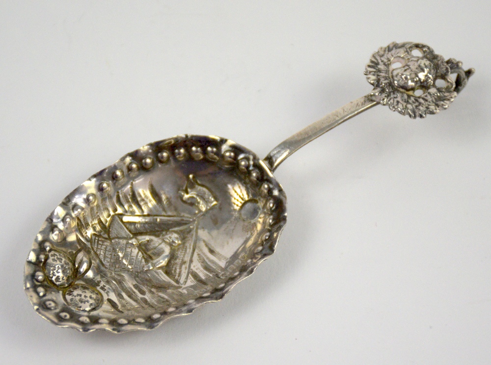 Continental silver caddy spoon with a scene of a fishing boat, import marks for London, 1897,