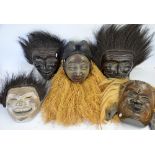 Five wall masks in the Japanese Noh theatre styleSold on behalf of the Phyllis Tuckwell Hospice
