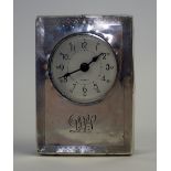 Silver fronted clock by Saunders & Shepherd, Birmingham, 1938, retailed by Wilson & Gill 113