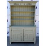 Grey painted pine kitchen dresser with plate rack over cupboards