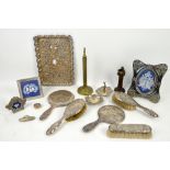 Collection of silver and silver-mounted items to include an embossed dressing table tray, hair and