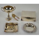 Silver trophy cup, cigarette box, pin dish and an ashtray,