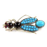 Turquoise and red stone bug brooch in white and yellow metal closed back setting, length 5 cm .