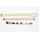 A single row cultured pearl necklace to a 14 ct gold clasp, length 48 cm, and a similar double row