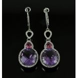 Contemporary drop earrings, set with oval cut amethyst and pear cut pink tourmalines, surrounded