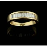 A diamond set half eternity ring set with baguette cut diamonds in 18 ct gold and a diamond ring