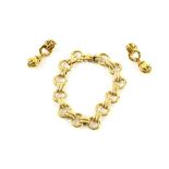 Gold bracelet, round links alternately set with oval double links, integrated clasp with two