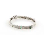 Diamond and emerald panel bracelet, rectangular links each set with three rows of round brilliant