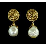 Jane Sarginson design, a pair of pearl drop earrings by gold swirls, with white baroque south sea