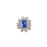 Sapphire and diamond ring, set with central oval sapphire of good colour, estimated at 4.78