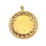 Edwardian full 1908 Sovereign in pendant mount, set in ornate twisted and beaded 9ct yellow gold