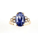 Art Deco period sapphire and diamond ring, with central oval sapphire estimated at 6.60 carats,