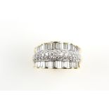 Diamond dress ring, set with round brilliant cut pave set band, and scalloped baguette cut border,