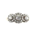 Antique three stone diamond cluster ring, set with old cut diamonds, estimated total diamond